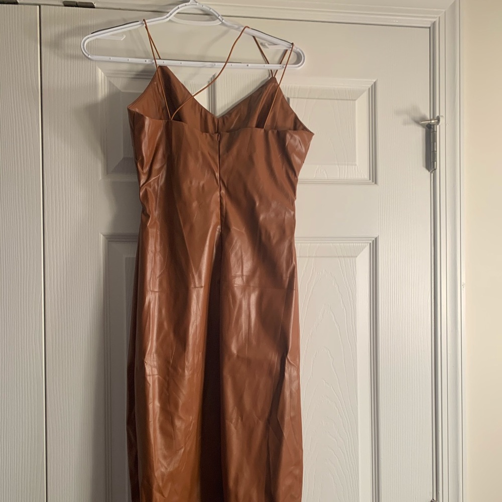 Brown faux leather dress with criss cross straps